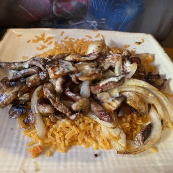 Los Bandidos - The A.C.C. Lunch special: sliced steak with grilled onions and mushrooms, topped with cheese dip and presented on a bed of rice. - Mexican Near Me - Clarksville, Virginia Los Bandidos - The A.C.C. Lunch special: sliced steak with grilled onions and mushrooms, topped with cheese dip and presented on a bed of rice. - Mexican Near Me - Clarksville, Virginia