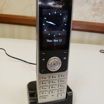Quick-Tel - Cordless Business Phone on recharging base station - Telecommunications Near Me Quick-Tel - Cordless Business Phone on recharging base station - Telecommunications Near Me