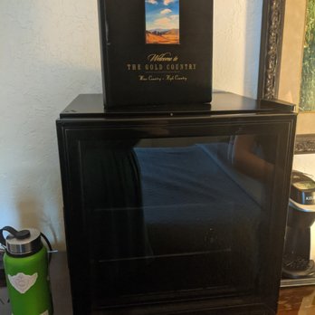Hotel Sutter - Mini fridge + guest guide in our room. - Hotels Near Me - Sutter Creek, California
