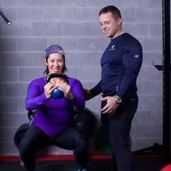 Fitness Experts - Michael working with a client.