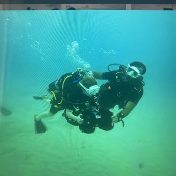 Trident Adventures - Make-A-Wish Colorado 11 year-old SCUBA diving down nearly 30 feet with master diver Steve - Dive Shops Near Me - Honolulu, Hawaii Trident Adventures - Make-A-Wish Colorado 11 year-old SCUBA diving down nearly 30 feet with master diver Steve - Dive Shops Near Me - Honolulu, Hawaii