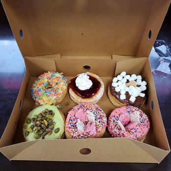 Painted Dough - Animal cookie, strawberry funnel cake, s'mores, pistachio, and fruity pebbles donut - Donuts Near Me - Chino, California Painted Dough - Animal cookie, strawberry funnel cake, s'mores, pistachio, and fruity pebbles donut - Donuts Near Me - Chino, California