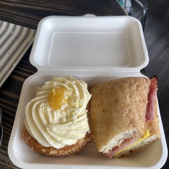 Rooted Coffeehouse Riverwood - Ham & cheese sandwich with a lemon curd muffin - Coffee & Tea Near Me - Evans, Georgia Rooted Coffeehouse Riverwood - Ham & cheese sandwich with a lemon curd muffin - Coffee & Tea Near Me - Evans, Georgia