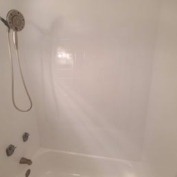 Fixed the wobbly shower head pipe, installed a new multi-purpose shower head, and changed out the faucet + tub overflow plate. Fixed the wobbly shower head pipe, installed a new multi-purpose shower head, and changed out the faucet + tub overflow plate.