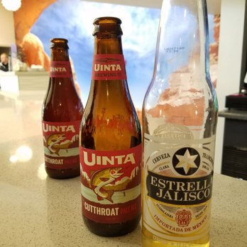 Bistro 435 - three bottles of beer sitting on a counter - American Near Me - Cedar City, Utah
