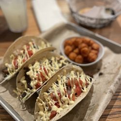 Fort Worth Steakhouse - Brisket tacos with sweet potato tots