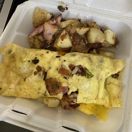 Tomato, onion, broccoli, and american cheese omelette, with home fries