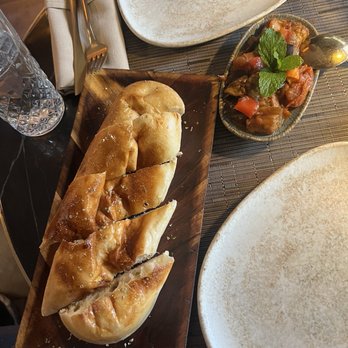 A La Turka - The eggplant shakshouka comes with a loaf of bread - Turkish Near Me - New York, New York A La Turka - The eggplant shakshouka comes with a loaf of bread - Turkish Near Me - New York, New York