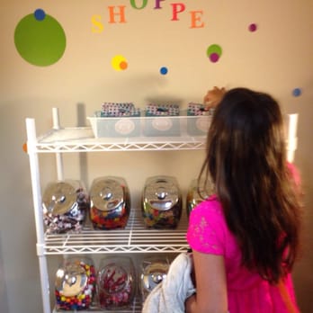 Walker-Dixon Orthodontics - Indianapolis - Z helps me choose sticky treats after getting my braces off. - Orthodontists Near Me - Indianapolis, Indiana Walker-Dixon Orthodontics - Indianapolis - Z helps me choose sticky treats after getting my braces off. - Orthodontists Near Me - Indianapolis, Indiana