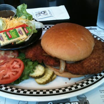 Hickory Park Restaurant Co. - Delux hand breaded pork tenderloin. - American Near Me - Ames, Iowa