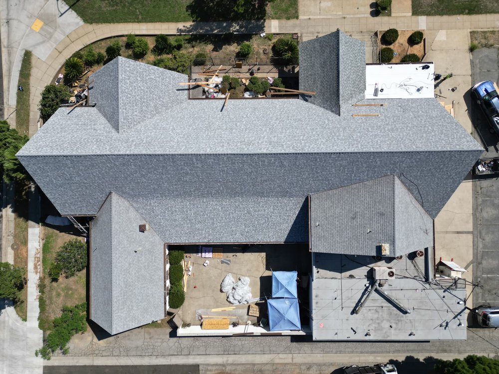 Slide of Rescue Roofing Construction