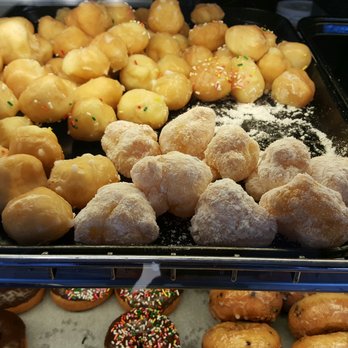 Sunshine Donuts - Note the powder sugar covered cream puffs. - Donuts Near Me - Brentwood, California Sunshine Donuts - Note the powder sugar covered cream puffs. - Donuts Near Me - Brentwood, California