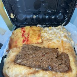 Meatloaf, mash potatoes, cream corn, cornbread