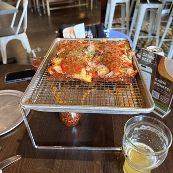 Fieldwork - Black Diamond pizza and Encore Hazy NA. Both amazing.  The peppers on the pizza get hot, but still amazing - Breweries Near Me - Sacramento, California
