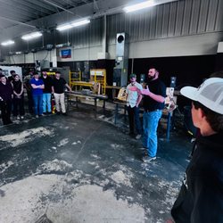 Mike's Heating & A/C Service - Mike talking with the PRCC HVACR students after donating a Trane unit.