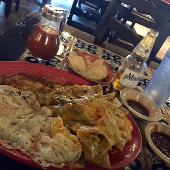 Zacatecas Cafe - Chilaquiles with green sauce, beans, and two eggs. Beans on point, eggs over cooked. No carne? I'd probably get it again. - Mexican Near Me - Riverside, California