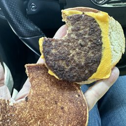Burnt cheeseburger. Burnt cheeseburger.