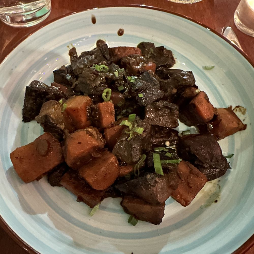 Maloya - Champignons bourguignon créole (braised portobellos and carrots in a spiced red wine sauce) - French Near Me - Brooklyn, New York