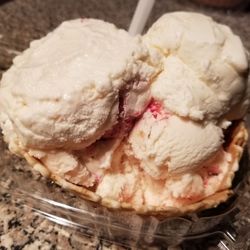 Fruteria Reyes - Coconut, Strawberry Cheesecake, and Strawberries and Cream ice cream in a waffle cone bowl.