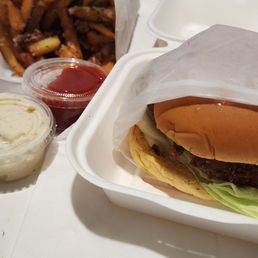 Spicy chicken sandwich and fries w/ garlic aioli & smokey ketchup Spicy chicken sandwich and fries w/ garlic aioli & smokey ketchup