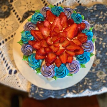 Ashbys - a close up of a cake with strawberries on top - Bakeries Near Me - Ottumwa, Iowa Ashbys - a close up of a cake with strawberries on top - Bakeries Near Me - Ottumwa, Iowa