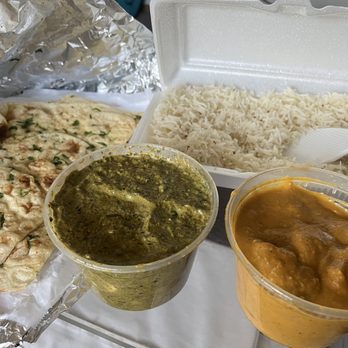Krishna Express - Garlic nan bread (left), saag paneer (middle), chicken coconut korma (right) - Indian Near Me - Roy, Utah Krishna Express - Garlic nan bread (left), saag paneer (middle), chicken coconut korma (right) - Indian Near Me - Roy, Utah