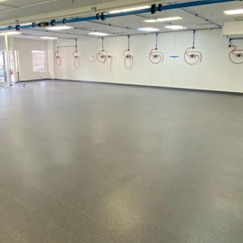 Marc's Flooring and Cabinets - VCT Tile installed at GoodCat Labs - Flooring Near Me - Naples, Florida