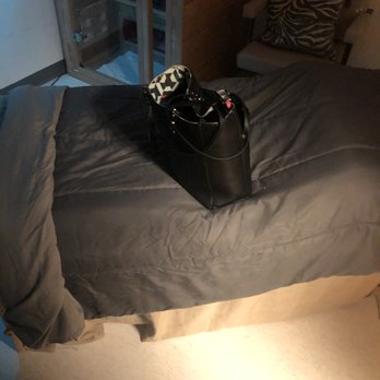 Touch of Sam - Massage table with cloth head rest area and no protective barrier between the cloth and your skin - Massage Near Me - Raleigh, North Carolina Touch of Sam - Massage table with cloth head rest area and no protective barrier between the cloth and your skin - Massage Near Me - Raleigh, North Carolina