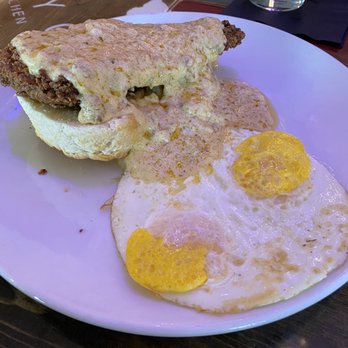 Tipsy Chicken Kitchen & Cocktails - Chicken Biscuits and Gravy with 2 Eggs over medium. - Cocktail Bars Near Me - Elk River, Minnesota Tipsy Chicken Kitchen & Cocktails - Chicken Biscuits and Gravy with 2 Eggs over medium. - Cocktail Bars Near Me - Elk River, Minnesota