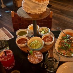 Drinks and their chip and salsa tower Drinks and their chip and salsa tower