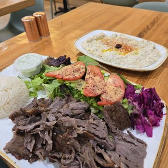Hummus Mediterranean Kitchen - Lamb and beef gyro plate and babagannoush best couple ever . And they have delicious flatbread options . - Mediterranean Near Me - Mountain View, California Hummus Mediterranean Kitchen - Lamb and beef gyro plate and babagannoush best couple ever . And they have delicious flatbread options . - Mediterranean Near Me - Mountain View, California