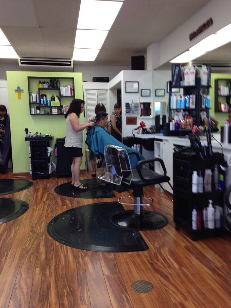 Hair In Action Logo