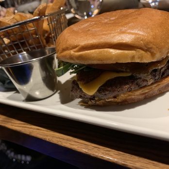 Mantles Restaurant & Lounge - Burger with cheese and bacon and fries. - Lounges Near Me - Sun Peaks, British Columbia Mantles Restaurant & Lounge - Burger with cheese and bacon and fries. - Lounges Near Me - Sun Peaks, British Columbia