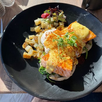 Eves Eatery - Salmon Benedict $14.99 (as of 1/28/2022) salmon + saute spinach + hollandaise + cherry tomatoes + poached eggs + english muffin + hashbrowns - Pizza Near Me - Carson City, Nevada Eves Eatery - Salmon Benedict $14.99 (as of 1/28/2022) salmon + saute spinach + hollandaise + cherry tomatoes + poached eggs + english muffin + hashbrowns - Pizza Near Me - Carson City, Nevada