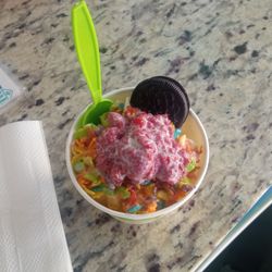 I-CE-NY - Sweet cream ice cream corn flakes inside raspberries Oreos and fruity pebbles on top condensed milk as my syrup
