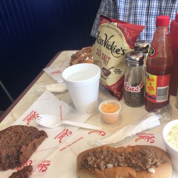 Skins' Hotdogs - man sitting at a table - Fast Food Near Me - Anderson, South Carolina Skins' Hotdogs - man sitting at a table - Fast Food Near Me - Anderson, South Carolina