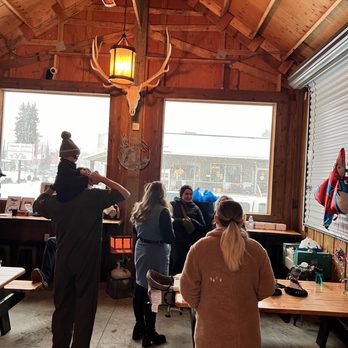 Tukes Taphouse - a group of people standing around a table - Pizza Near Me - Battle Ground, Washington Tukes Taphouse - a group of people standing around a table - Pizza Near Me - Battle Ground, Washington