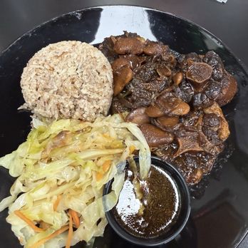 Papa's Got Jerk - Oxtail w/ Butter Beans, cabbage and rice. - Chicken Shop Near Me - St. George, Utah Papa's Got Jerk - Oxtail w/ Butter Beans, cabbage and rice. - Chicken Shop Near Me - St. George, Utah