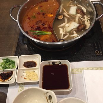 Shabu-Zen - Left side is Mongolian broth Right side is mushroom broth. Taste is no different - Japanese Near Me - Allston, Massachusetts Shabu-Zen - Left side is Mongolian broth Right side is mushroom broth. Taste is no different - Japanese Near Me - Allston, Massachusetts