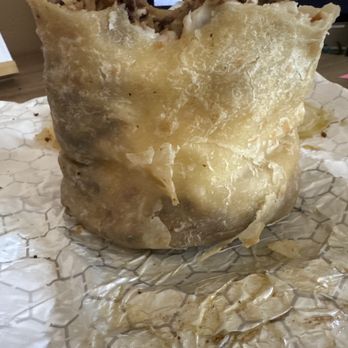 Todo Pa' La Cruda - Asada burrito added rice. I've eaten more than half already. Big portions! - Mexican Near Me - San Diego, California Todo Pa' La Cruda - Asada burrito added rice. I've eaten more than half already. Big portions! - Mexican Near Me - San Diego, California