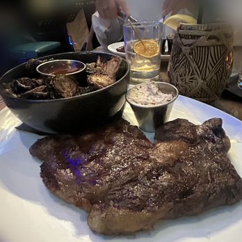 18th & 21st - Juicy and perfectly seasoned ribeye with a side of Brussels - Cocktail Bars Near Me - Columbia, Maryland
