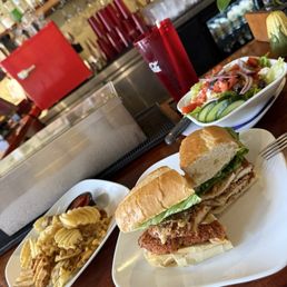 Waffle fries, Greek salad, buffalo chicken sandwich