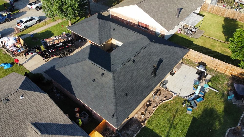 Slide of Space City Roofing & Remodeling