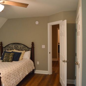 Two Rivers Built - a bedroom with a ceiling fan - General Contractors Near Me Two Rivers Built - a bedroom with a ceiling fan - General Contractors Near Me