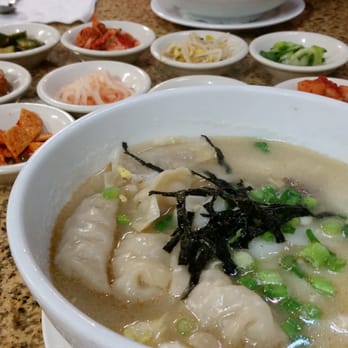 Korean Grill - Dduk gook (rice cake soup) with a ton of side dishes - Korean Near Me - Austin, Texas Korean Grill - Dduk gook (rice cake soup) with a ton of side dishes - Korean Near Me - Austin, Texas