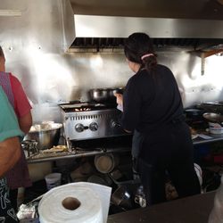 Taqueria Guanajuato - Ladies busy at the stove preparing the Sunday meals