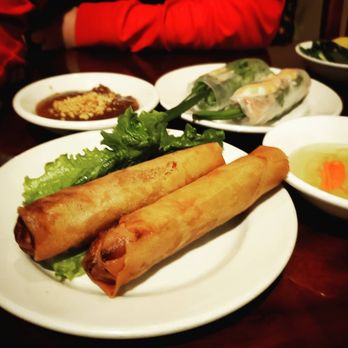 Pho Vinh - Fried spring roll (cha gio) in the front with peanut sauce behind it Summer roll (goi cuon) in the back with fish sauce in front of it - Vietnamese Near Me - Orlando, Florida Pho Vinh - Fried spring roll (cha gio) in the front with peanut sauce behind it Summer roll (goi cuon) in the back with fish sauce in front of it - Vietnamese Near Me - Orlando, Florida