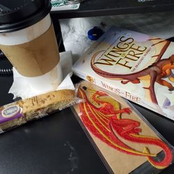 While Away Books - Coffee, lots of fantasy books, and even some cool handmade bookmarks! Got an orange mocha, very good!