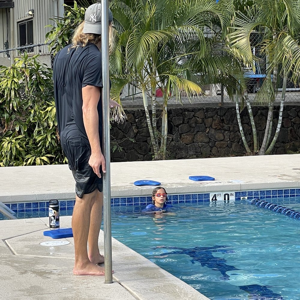 Oahu Club - Instructor teaching our kid swimming. - Tennis Near Me - Honolulu, Hawaii Oahu Club - Instructor teaching our kid swimming. - Tennis Near Me - Honolulu, Hawaii