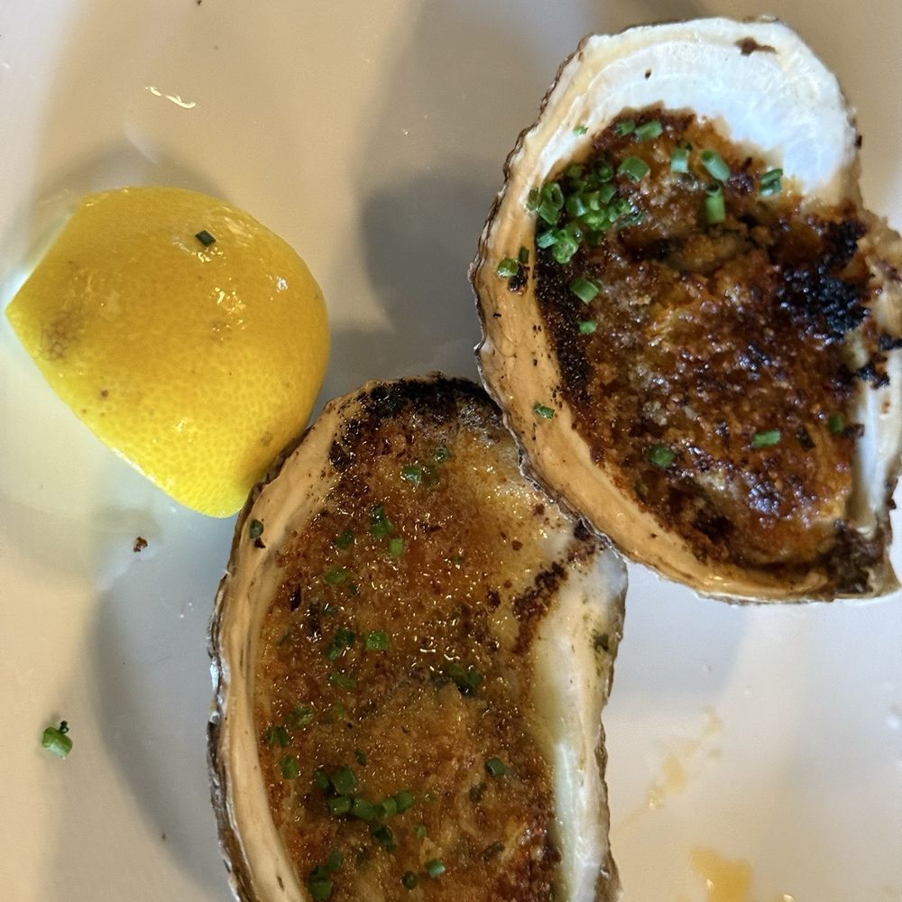 Bar Clementine - Grilled Oyster: Bourbon butter - Cocktail Bars Near Me - Islip, New York Bar Clementine - Grilled Oyster: Bourbon butter - Cocktail Bars Near Me - Islip, New York